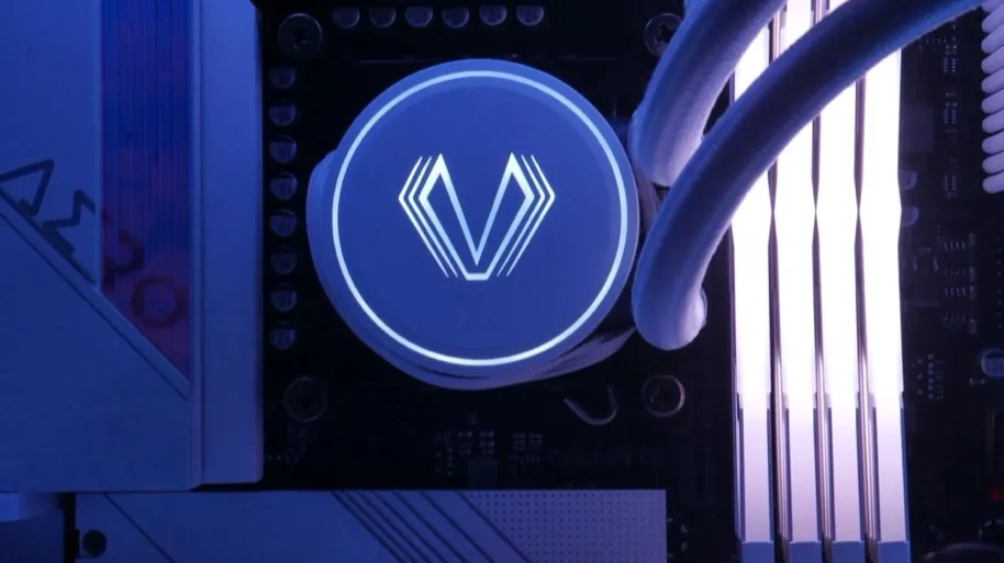 Liquid-cooler and memory detail in a completed blue-lit gaming PC
